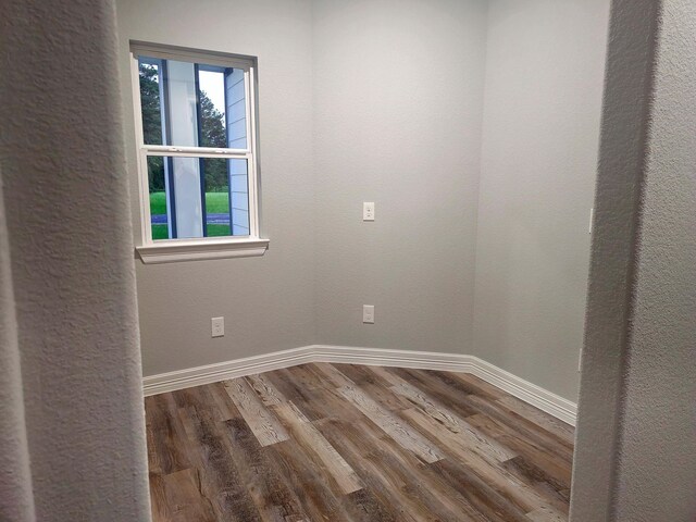 20 Lazy Spgs, Trinity, TX 75862 - empty room featuring wood finished floors and baseboards