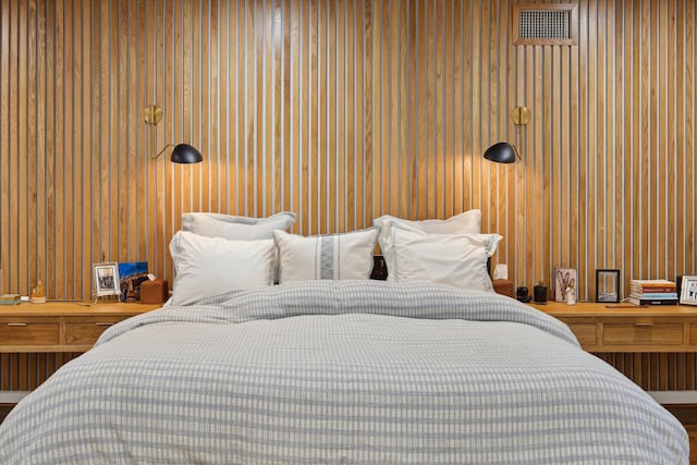 bedroom featuring visible vents