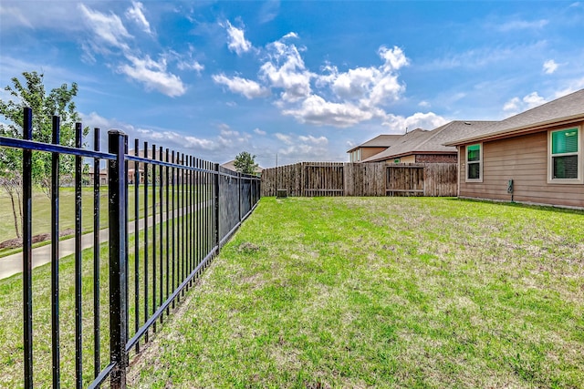 view of yard featuring fence