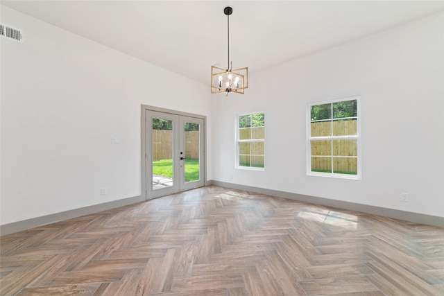 11931 S Red Cedar Cir, The Woodlands, TX 77380 - empty room with french doors, a chandelier, and baseboards