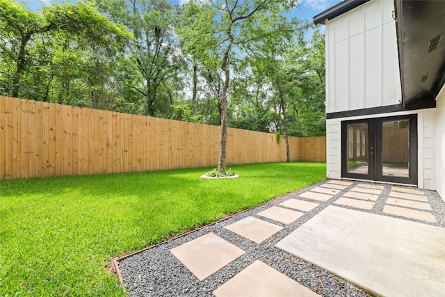 11931 S Red Cedar Cir, The Woodlands, TX 77380 - view of yard featuring a patio and french doors
