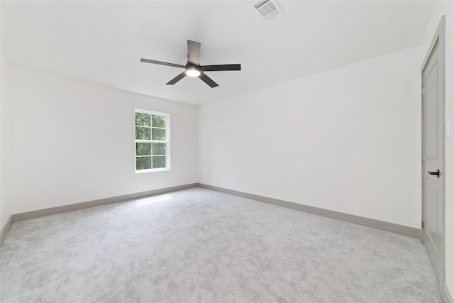 11931 S Red Cedar Cir, The Woodlands, TX 77380 - empty room featuring ceiling fan, baseboards, and light colored carpet