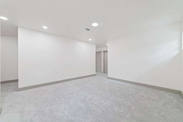 11931 S Red Cedar Cir, The Woodlands, TX 77380 - empty room featuring recessed lighting, baseboards, and light colored carpet
