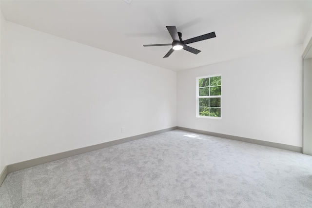 11931 S Red Cedar Cir, The Woodlands, TX 77380 - spare room featuring a ceiling fan, carpet, and baseboards