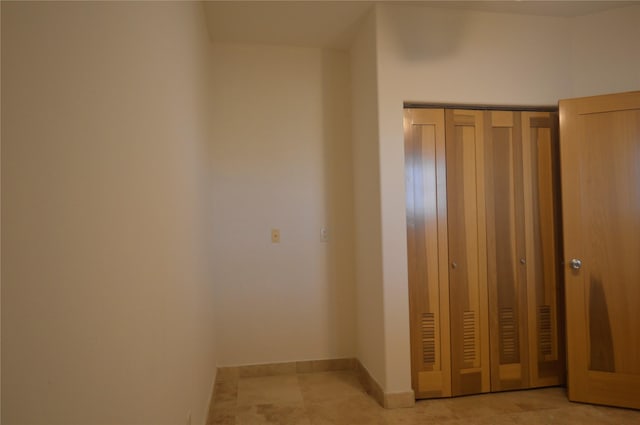unfurnished bedroom featuring baseboards