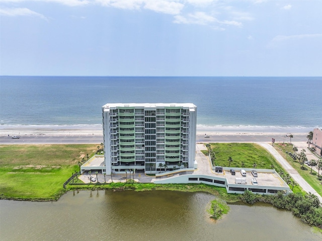 bird's eye view with a view of the beach and a water view