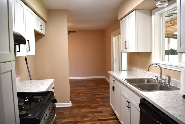 12112 Fm-457, Cedar Lane, TX 77415 - kitchen with a sink, black dishwasher, stainless steel stove, baseboards, and dark wood-type flooring