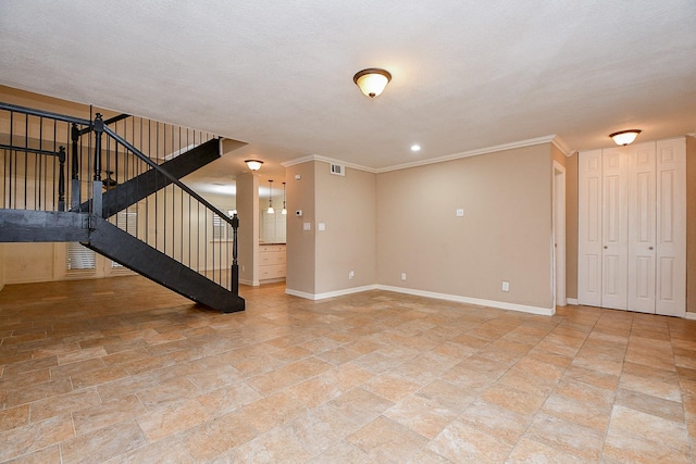 unfurnished living room with stairway, stone finish flooring, baseboards, and visible vents