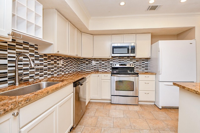 kitchen with recessed lighting, stainless steel appliances, visible vents, ornamental molding, and a sink
