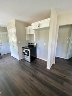 kitchen with white cabinets, stainless steel electric stove, baseboards, and dark wood finished floors
