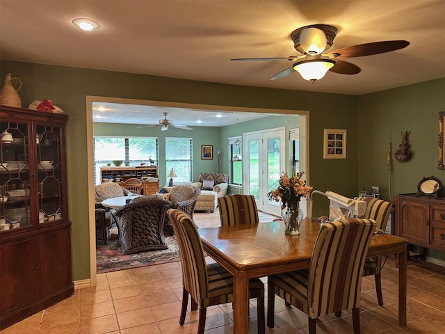 dining space featuring recessed lighting, ceiling fan, and light tile patterned floors
