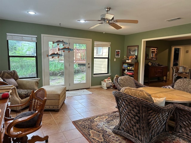 living area with recessed lighting, visible vents, a ceiling fan, light tile patterned floors, and baseboards