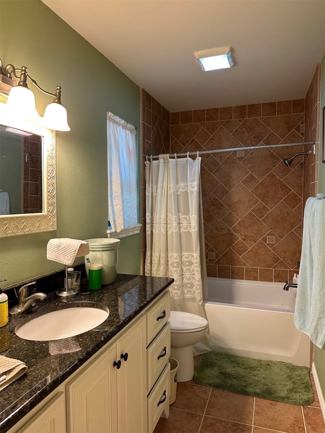 bathroom featuring shower / tub combo with curtain, toilet, vanity, and tile patterned floors