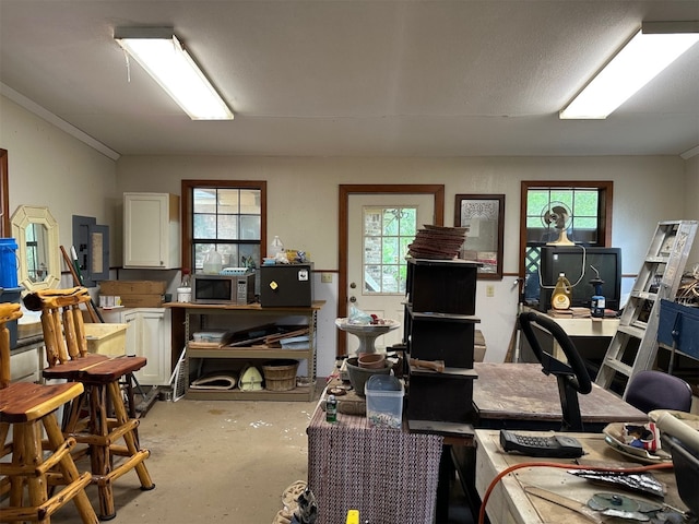 office featuring concrete floors and plenty of natural light