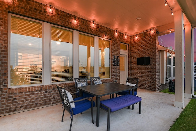 view of patio with outdoor dining area