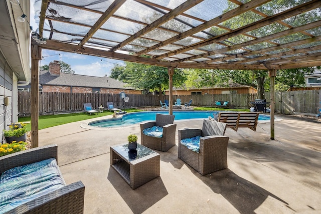 view of swimming pool featuring grilling area, an outdoor hangout area, a fenced in pool, and a fenced backyard