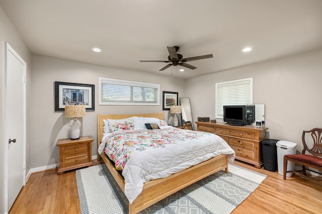 bedroom featuring ceiling fan, baseboards, light wood-style floors, and recessed lighting