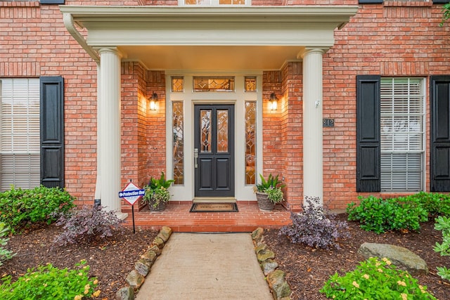 1842 Lake Winds, Missouri City, TX 77459 - property entrance with brick siding and a porch