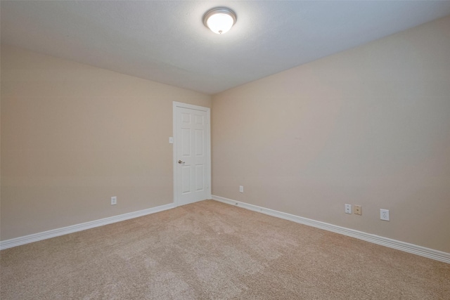 1842 Lake Winds, Missouri City, TX 77459 - spare room with baseboards, vaulted ceiling, and light colored carpet
