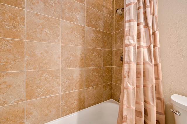 1842 Lake Winds, Missouri City, TX 77459 - bathroom with shower / tub combo with curtain and toilet