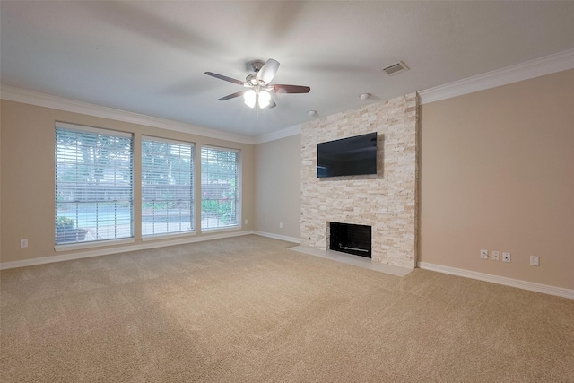 1842 Lake Winds, Missouri City, TX 77459 - unfurnished living room with a ceiling fan, crown molding, carpet floors, a fireplace, and visible vents