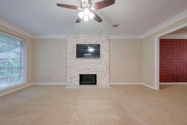 1842 Lake Winds, Missouri City, TX 77459 - unfurnished living room with carpet floors, crown molding, a stone fireplace, and visible vents