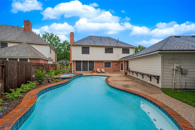 1842 Lake Winds, Missouri City, TX 77459 - view of pool featuring a fenced backyard, a patio, and a pool with connected hot tub