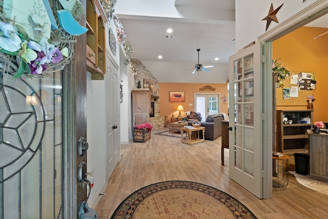 25672 Magnolia Pines Dr, Magnolia, TX 77355 - foyer featuring french doors, wood finished floors, ceiling fan, vaulted ceiling, and recessed lighting