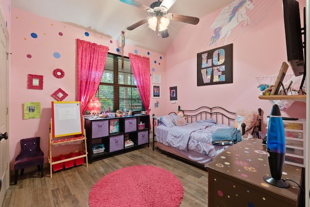25672 Magnolia Pines Dr, Magnolia, TX 77355 - bedroom with wood finished floors, lofted ceiling, and ceiling fan