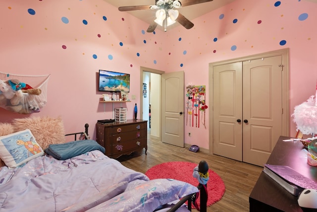 25672 Magnolia Pines Dr, Magnolia, TX 77355 - bedroom with light wood-style floors, a closet, and high vaulted ceiling