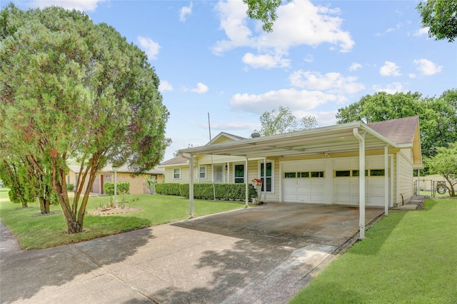 single story home featuring concrete driveway, an attached garage, and a front lawn