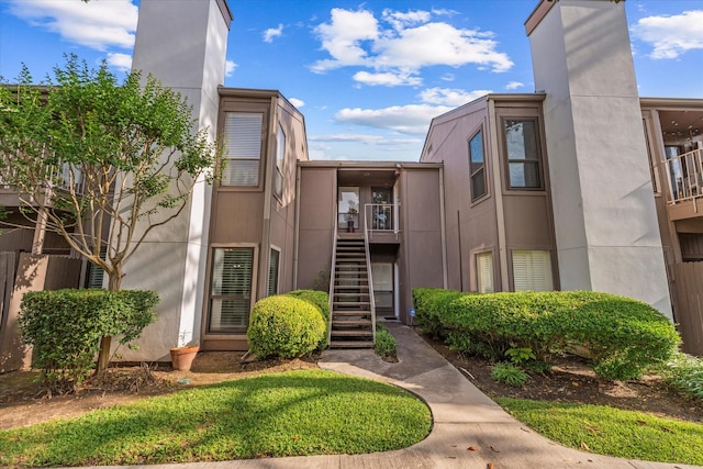 1201 Bering Dr Unit 28, Houston, TX 77057 - view of building exterior with stairs