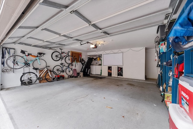 1201 Bering Dr Unit 28, Houston, TX 77057 - garage with a garage door opener