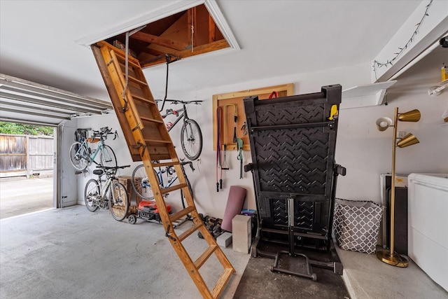 1201 Bering Dr Unit 28, Houston, TX 77057 - garage featuring washing machine and dryer