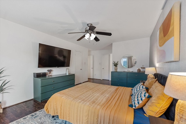 1201 Bering Dr Unit 28, Houston, TX 77057 - bedroom with ceiling fan and dark wood-type flooring