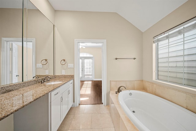 3444 Cline St, Houston, TX 77020 - full bath featuring a bath, lofted ceiling, tile patterned floors, and vanity