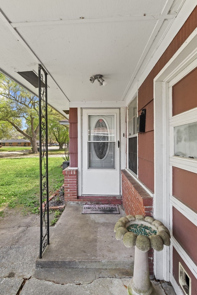 3721 Avalon Ave, Port Arthur, TX 77642 - view of exterior entry featuring a porch and a yard