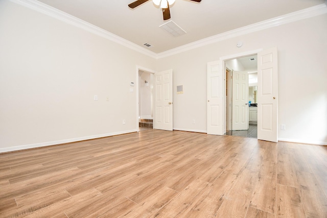 unfurnished bedroom featuring visible vents, ornamental molding, baseboards, light wood-style flooring, and ceiling fan