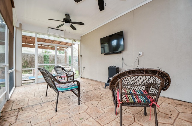 sunroom / solarium featuring a wall unit AC and ceiling fan