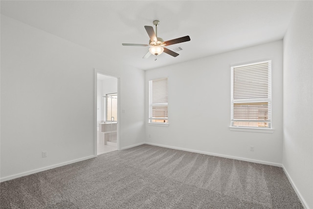 3220 Bello Green Ln, Katy, TX 77493 - carpeted spare room featuring ceiling fan, healthy amount of natural light, and baseboards
