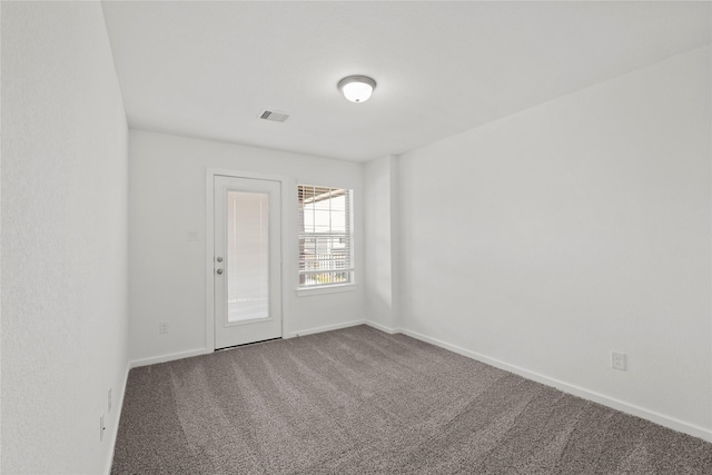 3220 Bello Green Ln, Katy, TX 77493 - carpeted spare room with baseboards