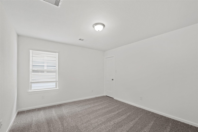 3220 Bello Green Ln, Katy, TX 77493 - carpeted spare room with baseboards