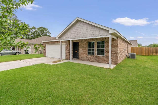 single story home with concrete driveway, fence, a garage, brick siding, and a front yard