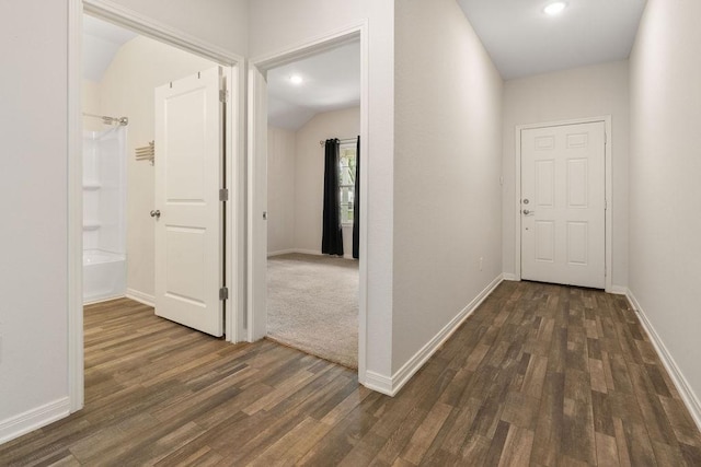 hall featuring dark wood finished floors and baseboards