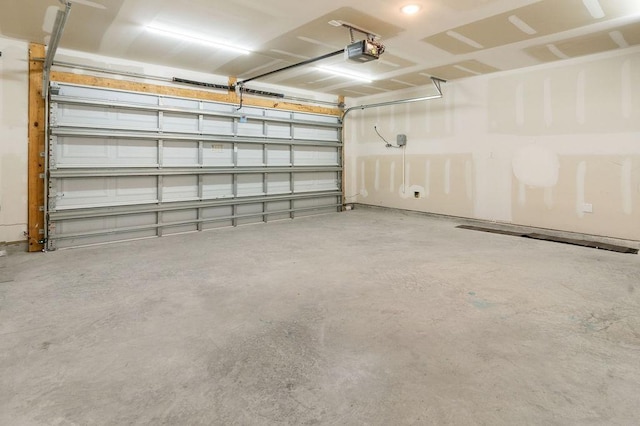 garage featuring a garage door opener