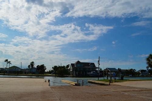 4215 San Jacinto Dr, Galveston, TX 77554 - exterior space with a water view