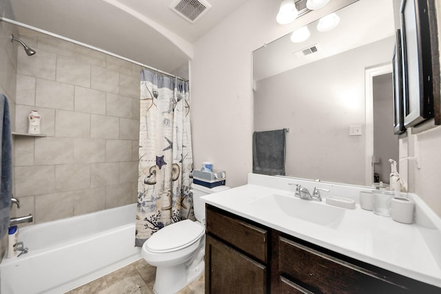 full bathroom featuring shower / tub combo, visible vents, vanity, and toilet