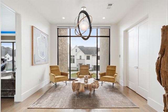 2703 Westgrove Ln, Houston, TX 77027 - sitting room with a wealth of natural light, visible vents, and light wood finished floors