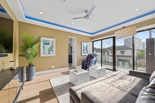 2703 Westgrove Ln, Houston, TX 77027 - bedroom featuring a tray ceiling, access to exterior, baseboards, recessed lighting, and wood finished floors