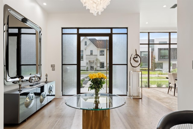2703 Westgrove Ln, Houston, TX 77027 - dining space with recessed lighting, wood finished floors, and an inviting chandelier
